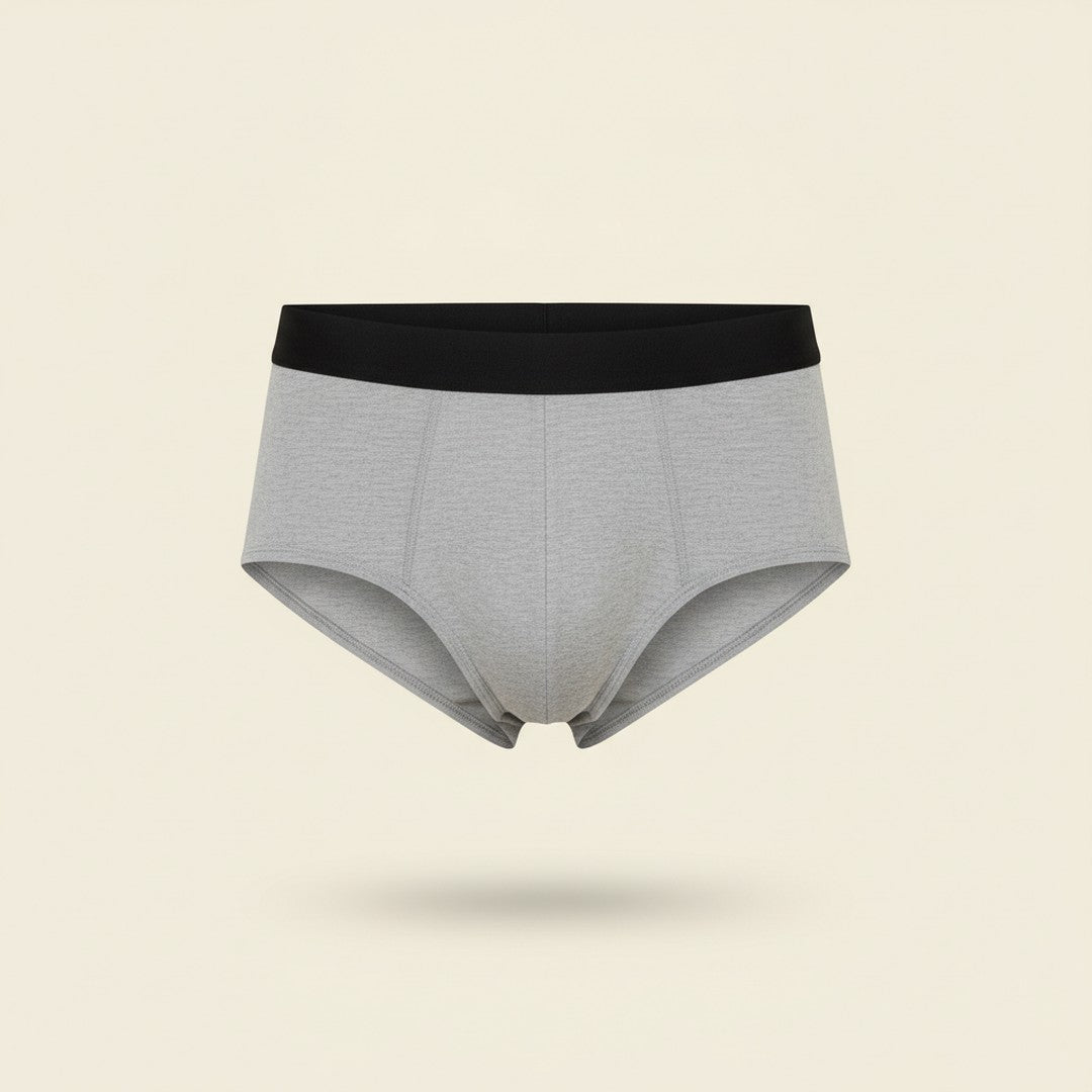 Sérényl — slip absorbant homme gris, packshot fond crème, lavable et réutilisable